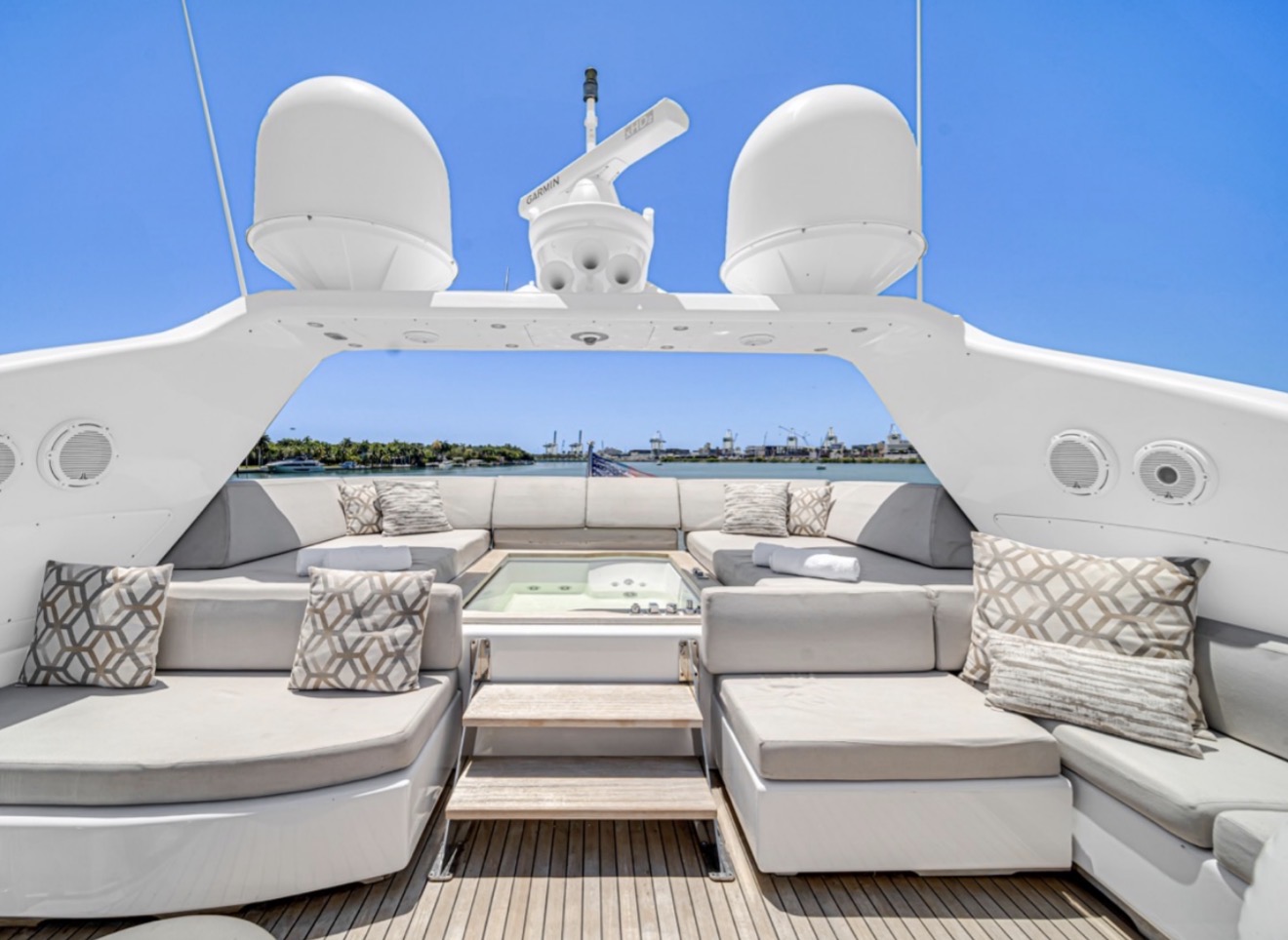 Miami sunset yacht charter golden hour flybridge jacuzzi